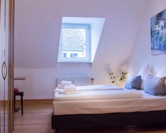 دينجدونج كوبلنز - سيتي أبارتمينتس - كوبلينز - غرفة نوم