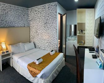 Grand Peninsula Suites Bataan - Balanga - Habitación