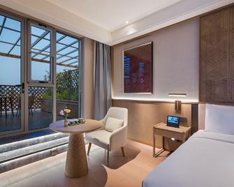 Manxin Hotel Xuzhou Longhu Qinyuan Mansion - Xuzhou - Living room
