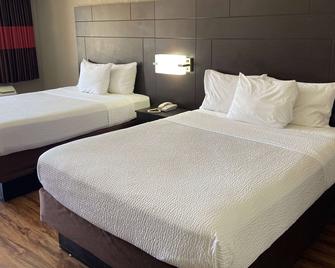 دايز إن باي ويندام توبيلو - توبيلو - غرفة نوم