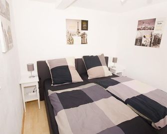 Vacation apartment 6 Deluxe - Ferienwohnungen Beckendorf - Losheim am See - Schlafzimmer