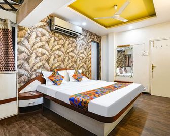 Fabhotel Saroj Inn - Mumbai Naka - Nashik - Slaapkamer