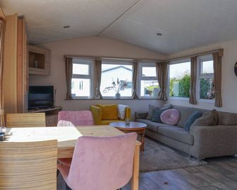 Camping de Zandput - 237 - Vrouwenpolder - Wohnzimmer