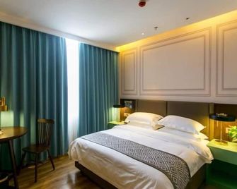 Gme Bozhou Qiaocheng District Jian'an Road Railway Station Hotel - Bozhou - Спальня