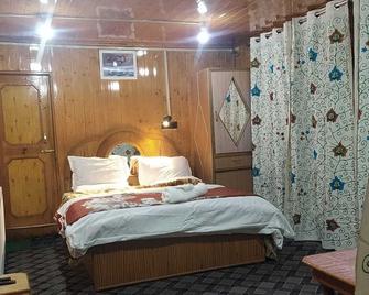 Goroomgo Roseland Cottage Gulmarg - Gulmarg - Ložnice