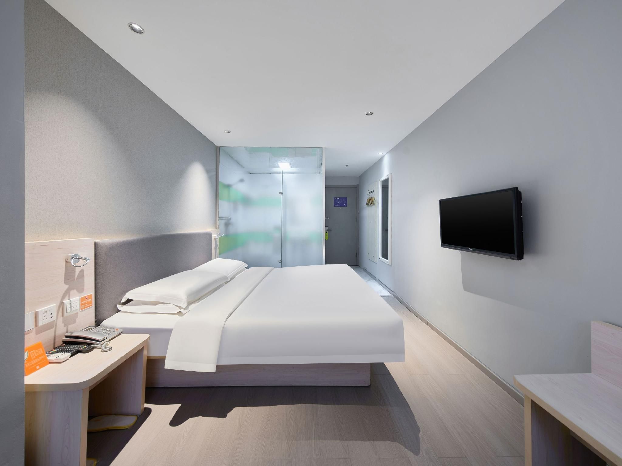 7 Days Inn Qinhuangdao Zhu Jiang Road Branch - تشينهوانغداو - غرفة نوم