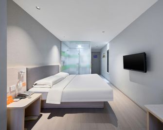 7 Days Inn Qinhuangdao Zhu Jiang Road Branch - Qinhuangdao - Bedroom