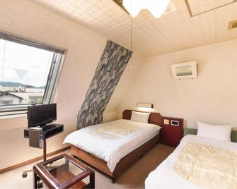 Business Hotel Tetuya - Asago - Bedroom