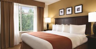 Country Inn & Suites Oklahoma City- Quail Springs - אוקלהומה סיטי - חדר שינה