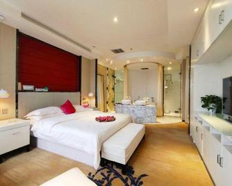 Zhongzhou Yihe Hotel (Dennis City Plaza) - Shangqiu - Спальня