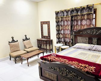 Charming 2-bedroom bungalow with WiFi and AC in lovely Sukkur plus Swimming Pool - Sukkur