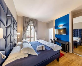 Album Boutique Rooms - Sassari - Schlafzimmer