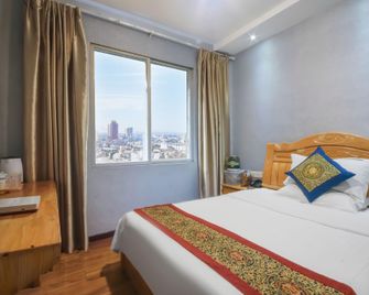 Kaili Haolaiwu Hotel - Qiandongnan - Bedroom