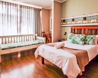 The Russel Guesthouse - Puerto Elizabeth - Habitación