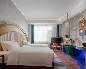 Sky Garden Hotel Kashgar Old City Branch - Kashgar - Bedroom