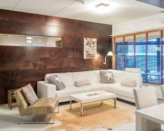 Holiday Home Tahko spa suites orange a 4 by Interhome - Tahkovuori - Olohuone
