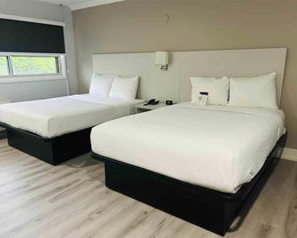 Canada Continental Hotel - Cornwall - Schlafzimmer