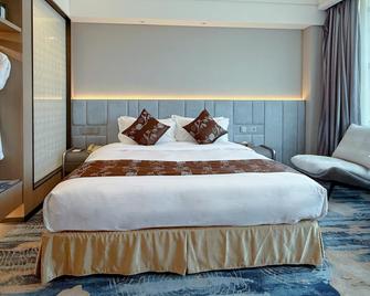 Romanjoy International Hotel Shenzhen - Shenzhen - Bedroom
