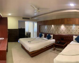 Hotel Adya Classic Near Narayana Hrudayalaya - Chandapura - Habitación
