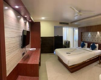 Hotel Adya Classic Near Narayana Hrudayalaya - Chandapura - Habitación