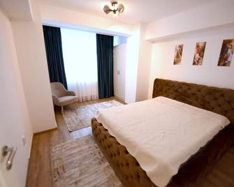 Blue Tower Apartments - Suceava - Bedroom