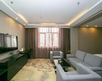 Zuixin Holiday Hotel - Jiuquan - Living room