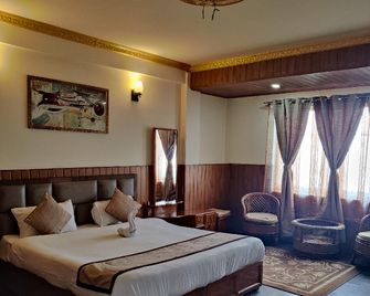 Hotel Kasturi Palace and Restaurant - Darjeeling - Ložnice