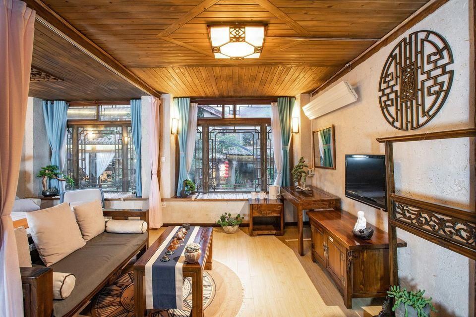 Xiaoqiao Bieyuan Inn - ليجيانغ - غرفة نوم