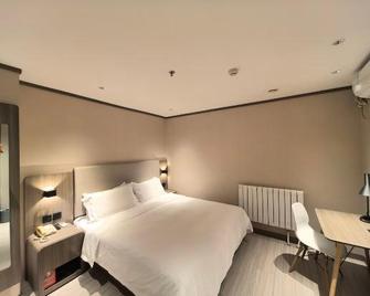Hanting Hotel Tianjin Development Zone Taida Msd - Tianjin - Schlafzimmer