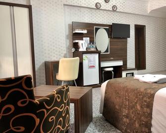 Hotel Fuat - ואן - חדר שינה