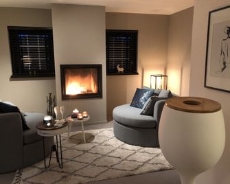 Onthaasten in de Achterhoek - Lievelde - Sala de estar
