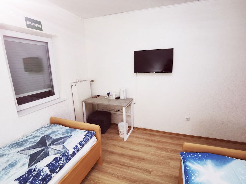 Home Inn Hotel - דורמאגן - חדר שינה