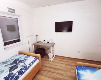 Home Inn Hotel - Dormagen - Habitación