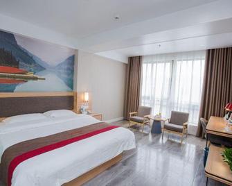 Thank Inn Chain Hotel Hebei Handan Guantao Zhuxian Road - Handan - Bedroom