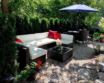 Save. 30% Until June 16 2026. One Block Downtown Harbor And Restaurants - Charlevoix - Patio