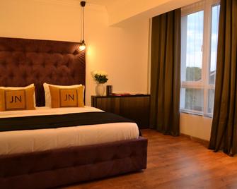 JN Boutique Apartments - Bucharest - Bedroom