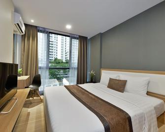 Ramada by Wyndham Bangkok Ten Ekamai Residences - Bangkok - Bedroom