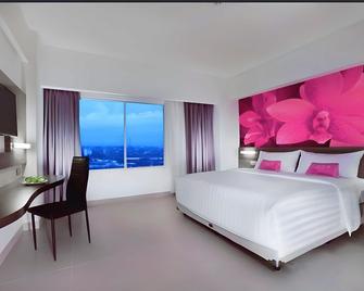 Yusra Inn Hotel Bekasi - Bekasi - Bedroom