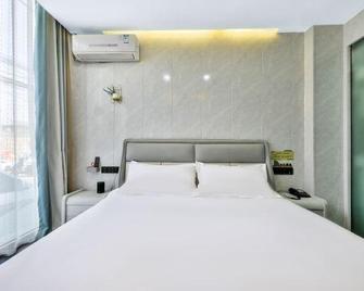 Xinxiangdao Business Hotel (Jinzhou Normal University) - Jinzhou - Bedroom