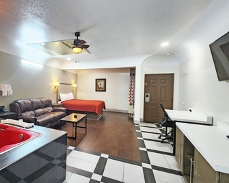 Scottish Inn & Suites Sam Houston Parkway - Houston - Bedroom