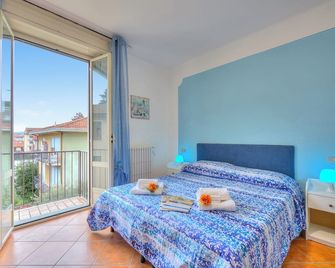 Riccardo House Stresa 1 min from Lake - Happy Rentals - Stresa - Habitación