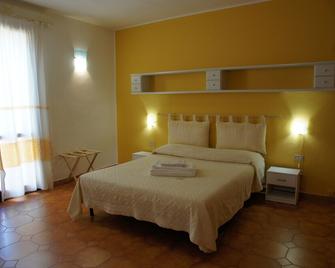 B&B Il Piccolo Giardino - Villasimius - Camera da letto
