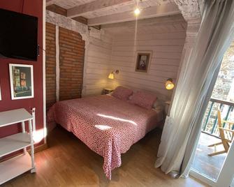 Apartamentos Alquitara - Ojedo - Habitación