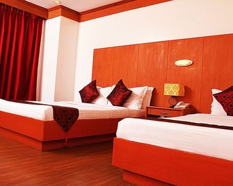 Naga Land Hotel - Naga - Camera da letto