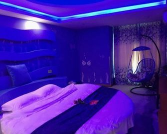 Thank Inn Hotel Zhejiang Huzhou Changxing County Textile City - Huzhou - Bedroom