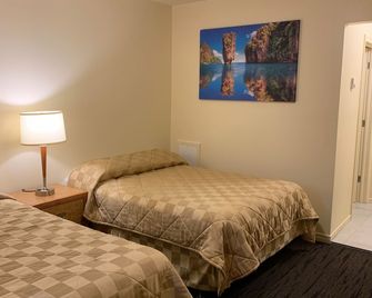 Travellers Choice Motel - ווינדזור - חדר שינה