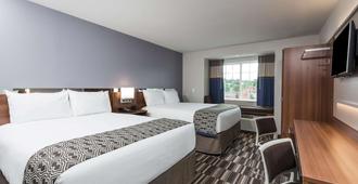 Microtel Inn & Suites by Wyndham Altoona - Altoona - Bedroom