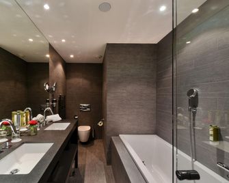 Hotel Vitznauerhof - Lifestyle Hideaway at Lake Lucerne - Vitznau - Bathroom
