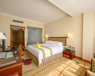 Quanzhou Overseas Chinese Hotel - تشيوانتشو - غرفة نوم