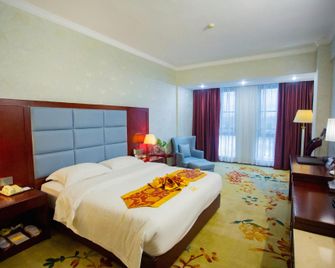 Qianjun International Hotel - Guilin - Bedroom